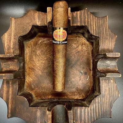 cigar in fancy ashtray